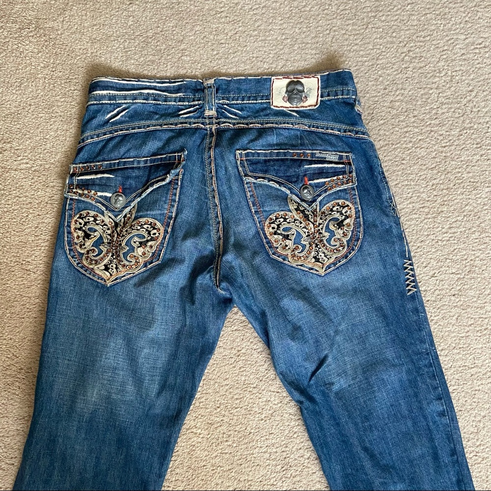 Lagunn Beach light wash scull crystal pocket jeans